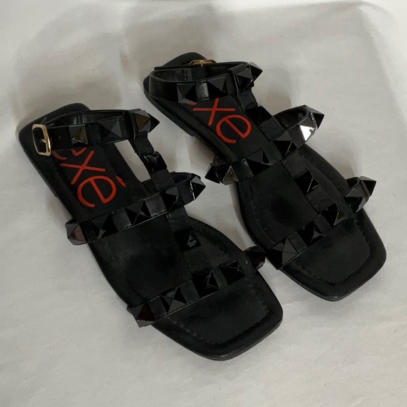 Exe’ Black Studded Ankle Strap Flat Sandals - Picture 1 of 7